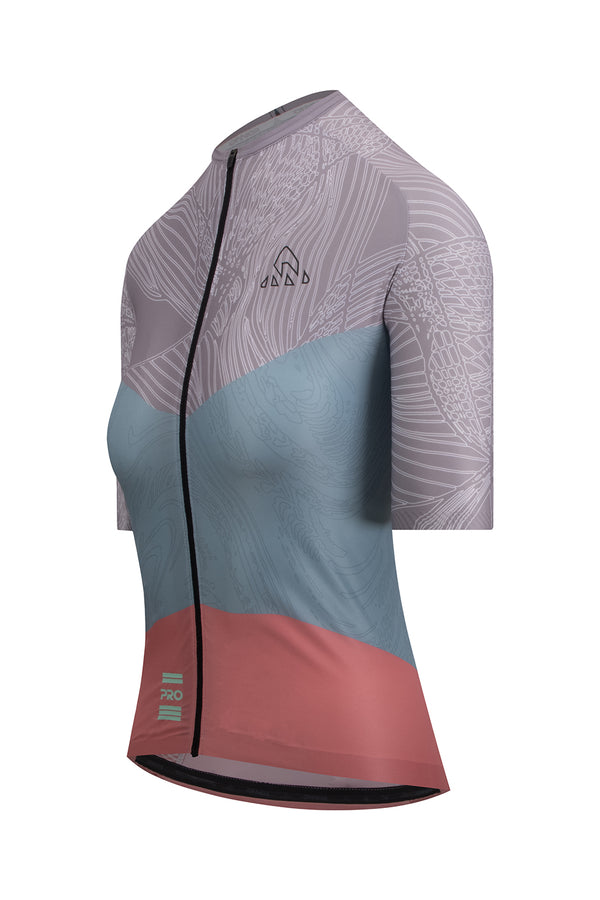  best women's cycling jerseys  -  Detailed image featuring the ONNOR logo on the Women's Nut Pro Cycling Jersey Short Sleeve in light brown and salmon. This shot displays the brand's dedication to crafting high-quality, performance-enhancing cycling attire, ensuring cyclists experience both comfort and style.