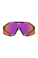 Sunglasses with a reflective purple lens and black frame on a white background