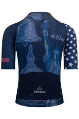 Rear view of the Men's American Pride 2023 Elite Cycling Jersey Short Sleeve by ONNOR in blue and red, showcasing the United States flag. This image accentuates the practical rear pockets and safety-enhancing reflective features, highlighting ONNOR's commitment to combining convenience, safety, and the spirit of American pride in their advanced cycling gear.