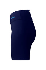 Side view of the blue women's shorts, focusing on the side lines and the top back pocket with zipper. The image captures the slim fit and the unique design of the pocket.