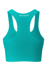 Rear view of a women's jade green fitness top, with elegant mint logos, positioned against a white backdrop to display the back features distinctly.