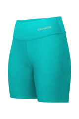 Semi-side front view of women's green shorts with a zipper pocket on the top back. This angle provides a glimpse of both the front and side profiles of the shorts
