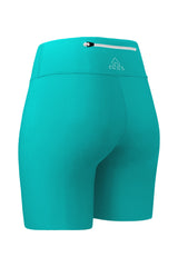 Back-side view of green women's shorts, highlighting the upper back pocket with a zipper. The angle offers a view of both the side and back of the shorts.