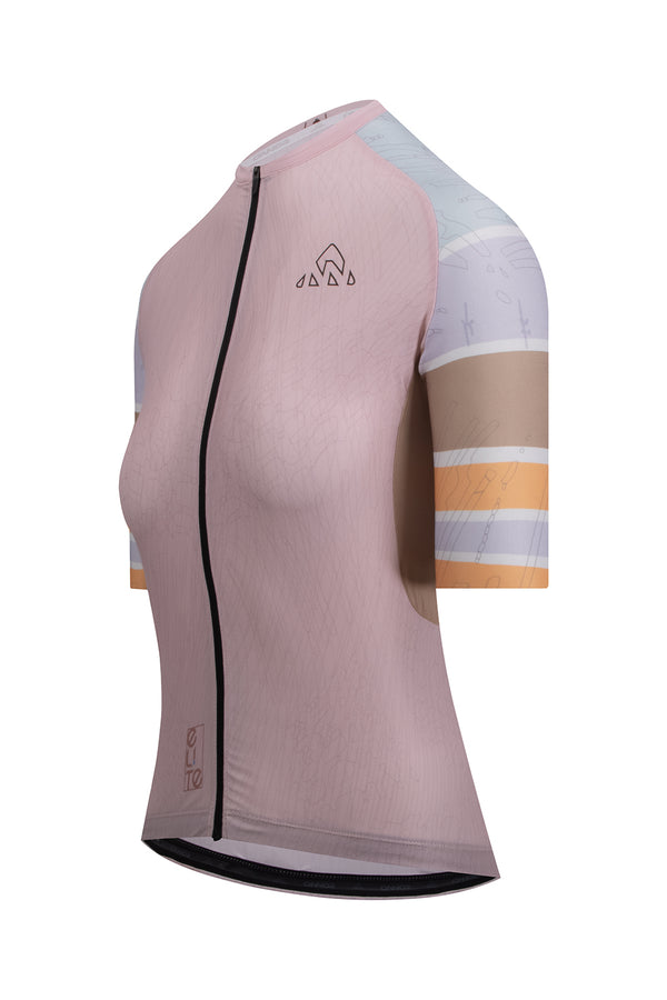 Essential gear a beginner cyclist should have  Close-up image showing the ONNOR logo on the Women's Njord Elite Cycling Jersey Short Sleeve in light pink and light brown. Signifies the brand's dedication to quality, high-performance cycling attire.