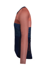 Detailed snapshot focusing on the sleeve of the Men's Tyr Elite Cycling Jersey Long Sleeve by ONNOR in blue and orange. The image showcases the brand's commitment to creating a comfortable, stylish, and performance-centric cycling jersey, emphasizing their aptitude for seamlessly integrating form and function.