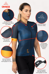 A short-sleeve women's biking jersey. The jersey has a sporty and dynamic design, with contrasting colors and bold graphics. It is made of a high-performance fabric that helps regulate body temperature and wicks away sweat.