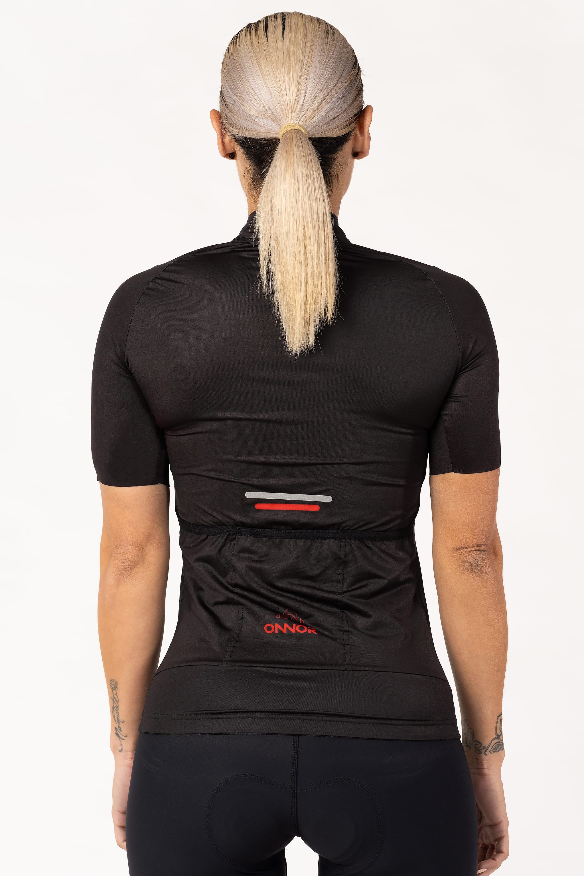 An image of a ladies' biking jersey with short sleeves. The jersey is made from high-quality fabric and offers a comfortable fit for women cyclists.