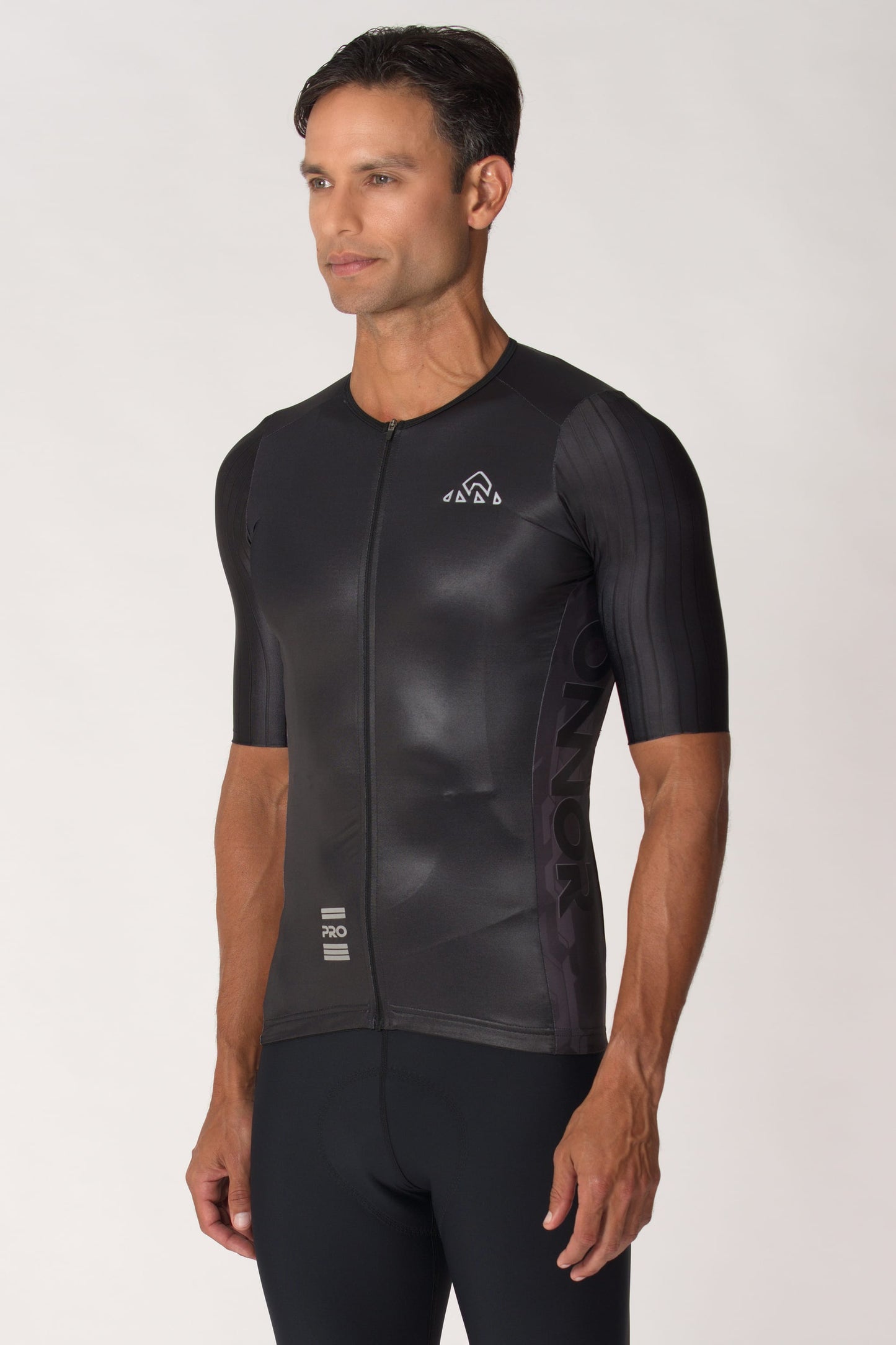 A photo of a men's biking top with short sleeves. This male cycling shirt is designed for optimal comfort and style, making it perfect for any biking adventure.