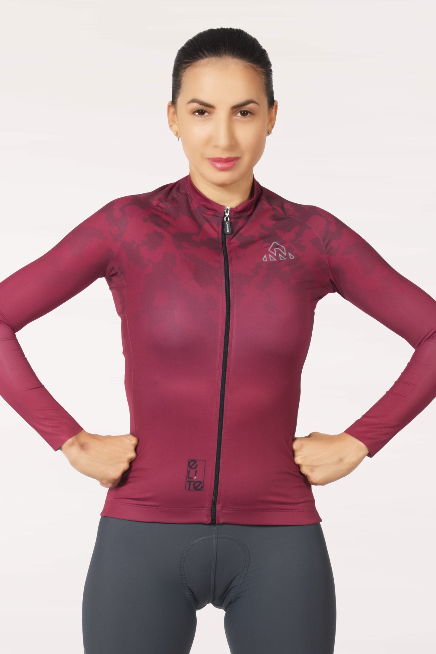A short-sleeve jersey for women cyclists, displayed on a flat surface. The jersey combines style and functionality, perfect for avid female riders.