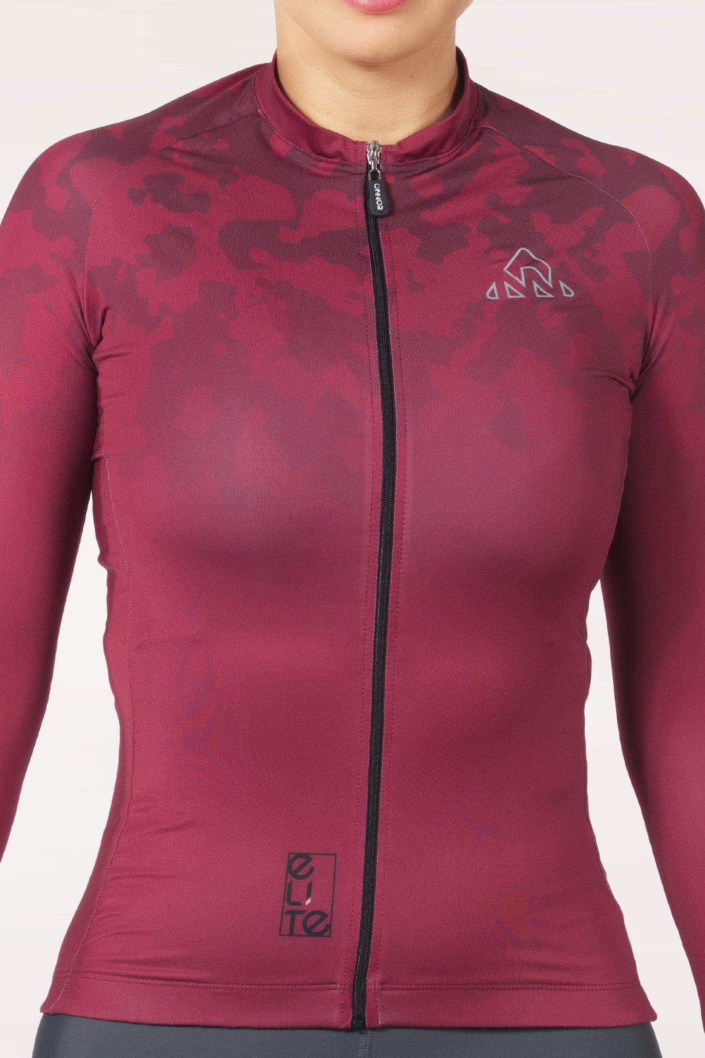 A women's cycling blouse in a short sleeve design, featuring a vibrant pattern. The blouse offers a lightweight and breathable option for female cyclists.