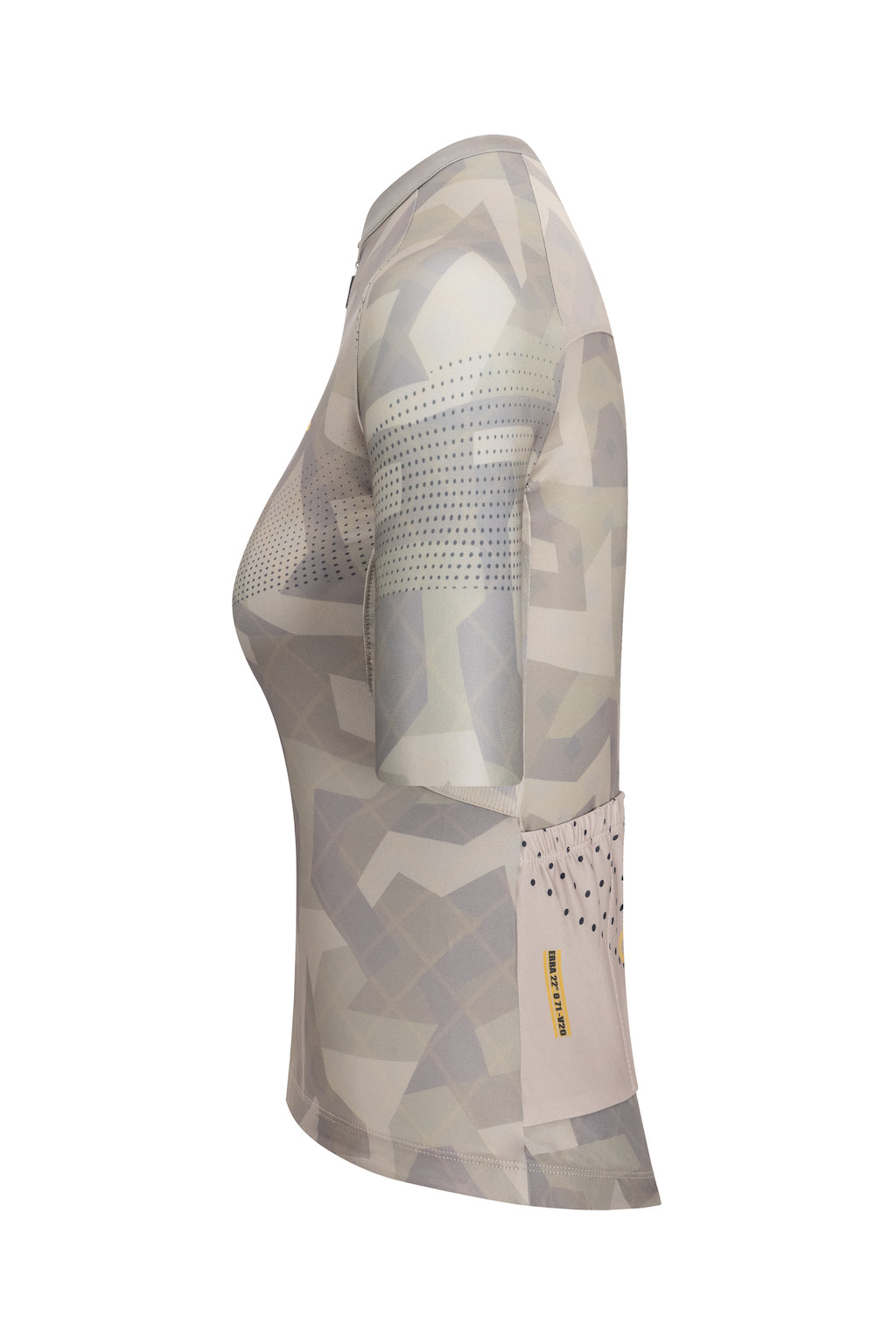 A women's bike clothing in a short sleeve cut, laid out on a bed. The clothing is designed to offer a balance of style and functionality for female cyclists.