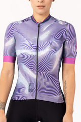 A ladies' bike shirt with sleeves ending before the wrists. The shirt features a whimsical and artistic pattern, expressing the cyclist's unique style. It is constructed with a stretchy and moisture-wicking fabric for enhanced comfort.
