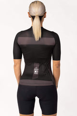 This ladies' cycling shirt is perfect for warm weather rides. The short-sleeved feminine bike jersey provides breathability and freedom of movement. Its sleek design and flattering fit make it an ideal choice for women cyclists.